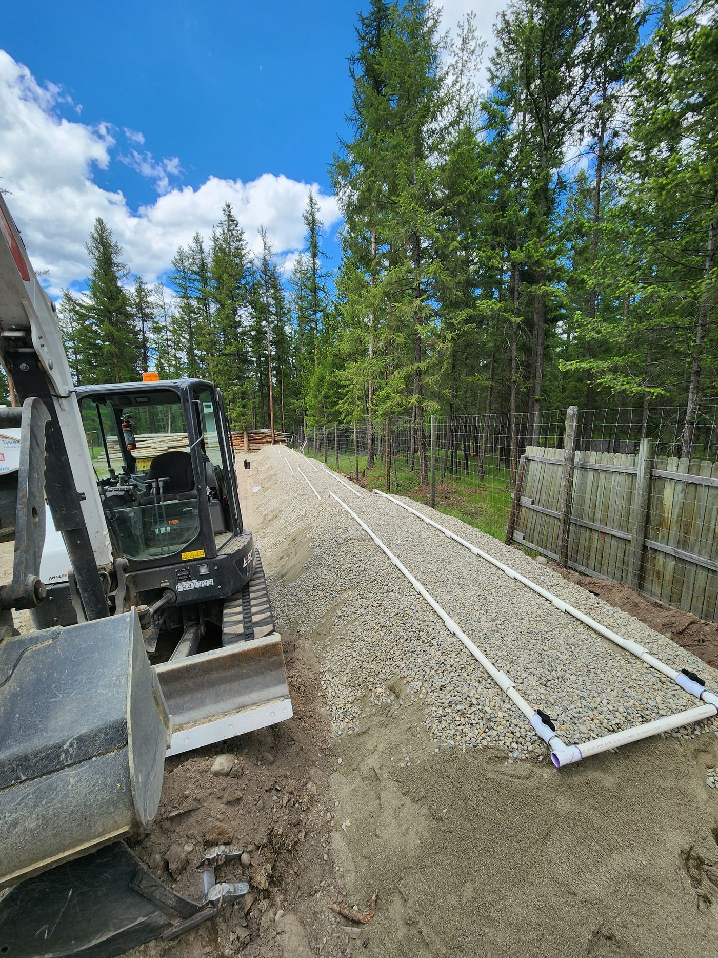 Pressure distribution laterals laid on a graded gravel bed